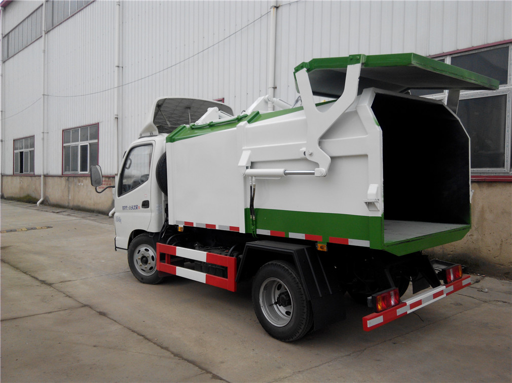 福田小卡(3方)側(cè)裝壓縮式垃圾車