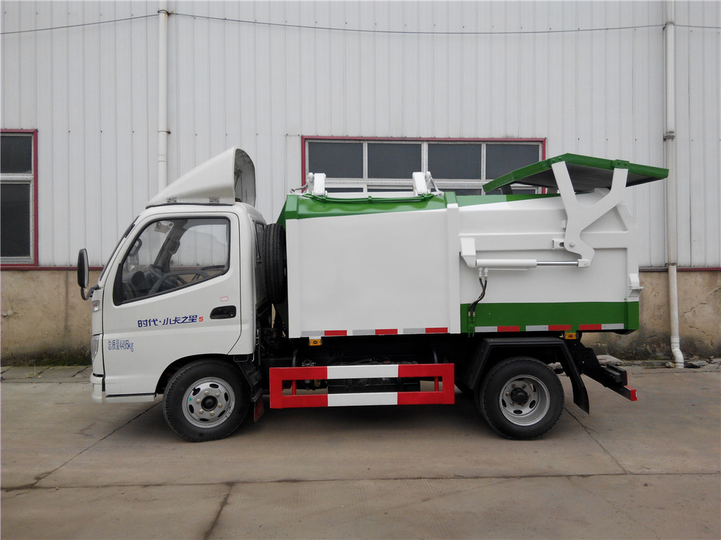 福田小卡(3方)側(cè)裝壓縮式垃圾車